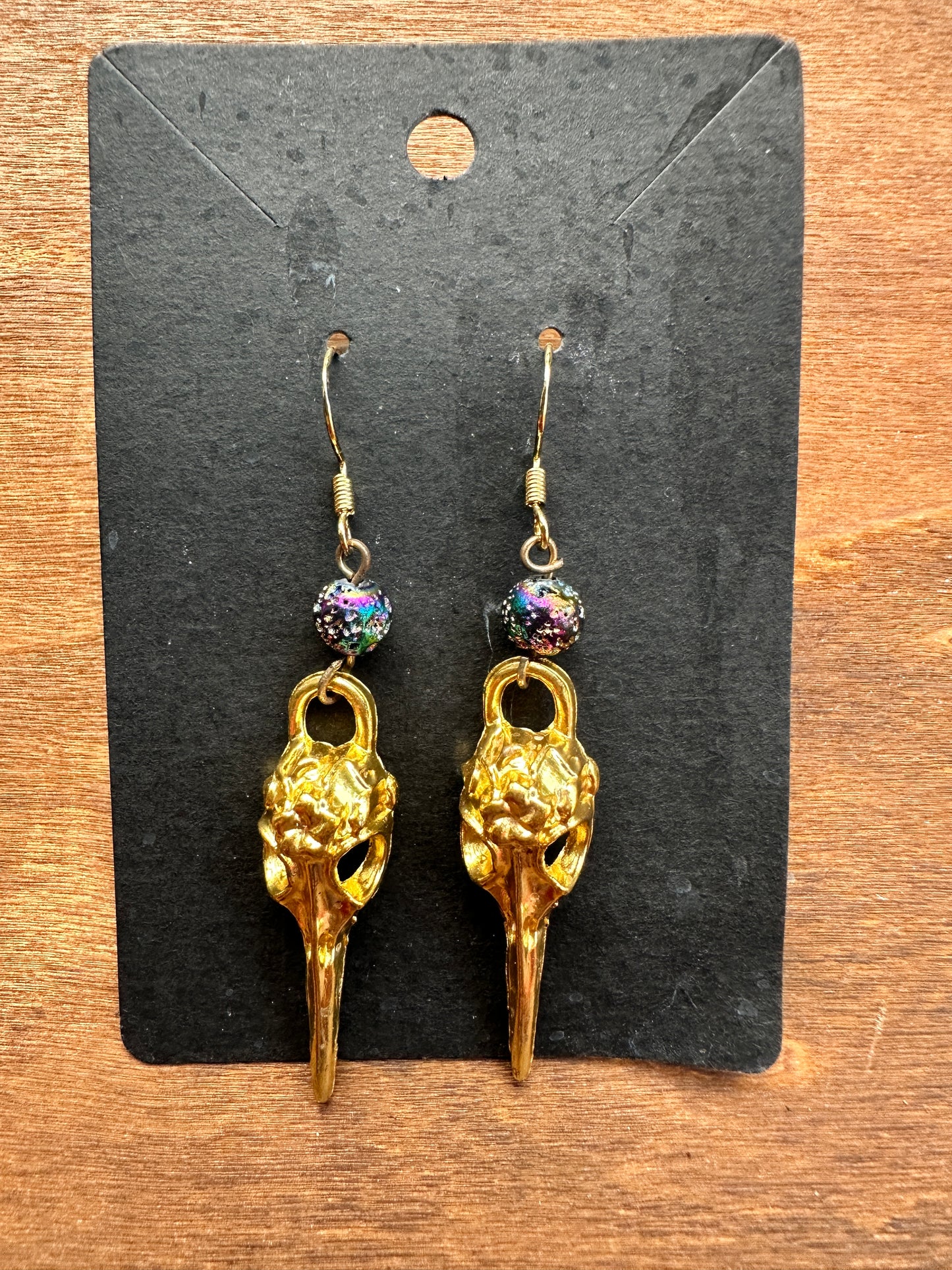 Gold & rainbow raven skulls
