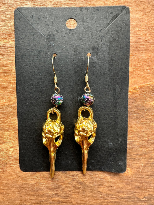 Gold & rainbow raven skulls