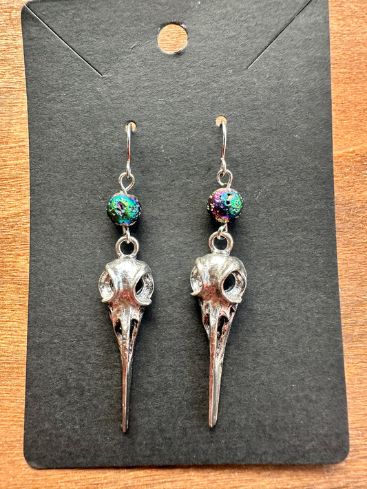 Silver & rainbow raven skulls